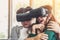 Happy couple watching video in virtual reality VR