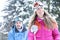 Happy couple in winter skiing