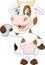 Happy cow animal holding a glass of milk on white background
