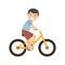 Happy cute boy riding bike. Healthy lifestyle concept. Little boy rides bicycle