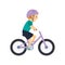Happy cute boy riding bike. Healthy lifestyle concept. Little child with helmet rides bicycle.
