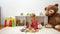 Happy cute child boy having fun playing with colorful wooden blocks on the floor, at home. Indoor activity for kids