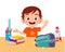 happy cute little kid boy with clean desk