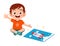 happy cute little kid boy play jigsaw puzzle