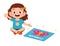 happy cute little kid girl play jigsaw puzzle