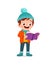 happy cute little kid study and wear jacket in winter season. child read book wearing warm clothes