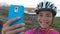 Happy Cyclist Photographing Using Smart phone - Healthy Active Lifestyle
