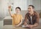 Happy dad and son making paper aircrafts