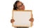 Happy dark skinned woman holding empty whiteboard