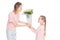 happy daughter gifting bouquet of flowers to her mom for mothers day,