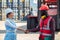 Happy dealing shaking hands two businesswoman and engineer working checking loading Containers box from Cargo freight ship for