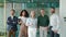 Happy diverse business people team standing in office, group portrait.