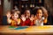 Happy diverse children raising painted hands kindergarten child kids playing playful joyful enjoying colorful paint