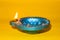 Happy diwali or happy deepavali greeting card made using a photograph of diya or oil lamp