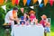 Happy dutch family having grill party in garden