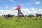 Happy dutch farmer with his cows