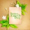 Happy Earth Day paper sheet with fresh spring green leafs borde