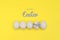 Happy easter background in illuminating yellow and ultimate grey colors of year 2021. Easter white eggs arranged in