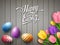 Happy Easter colorful egg with tulips flower beautifully above wooden gray background