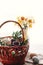 Happy Easter concept. stylish basket with painted eggs, bread, h