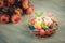 Happy Easter decorative bright colored Easter eggs and two Easter rabbits on colored background.