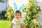 Happy easter. Easter background. Cute bunny. Child boy wearing bunny ears. Kid preparing for Easter. Happy family and