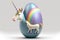 Happy Easter Easter eggs Design, A unicorn-inspired egg with a rainbow and a horn.