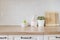 Happy Easter! Easter Eggs, Rabbit, Cutting Boards, Succulent On The Kitchen Counter. Bright And Clean Rustic Kitchen With White