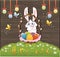 Happy easter with eggs and rabbit over wood background. Vector i