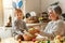 Happy easter! family grandmother and child with ears hare getting ready for holiday