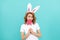 happy easter girl wear bunny ears hold yummy lollipop