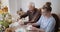 Happy Easter - Grandfather and granddaughter during Easter Breakfast.