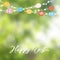 Happy Easter greeting card, invitation. String of lights, colorful Easter eggs and cherry blossoms. Modern blurred