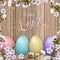 Happy Easter lettering, painted colorful eggs. Spring holidays, Easter background, blossom tree