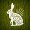 Happy easter rabbit sign. grass background.