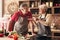 Happy elderly couple cooking lunch in kitchen together