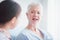 Happy Elderly patient talk with woman doctor at room in hospital. Healthcare homecare concept