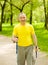 Happy elderly people engaged in Nordic walking