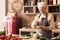 Happy elderly woman seasoning fresh salad with pepper mill