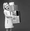 Happy elegant child on grey holding pile of Christmas giftes