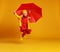 Happy emotional cheerful child girl jumping and laughing  with red umbrella   on colored yellow background