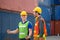 Happy engineer and foreman at industry containers cargo, Worker team at the construction site, Teamwork concepts