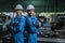 Happy engineering man industrial workers thumbs up wearing uniform safety in factory.