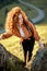 Happy Enthusiastic Active Redhead Lady Hiking Travelling Alone In Mountains