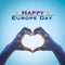 Happy Europe day  with European Union EU flag on people hands in heart love shape