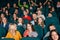 Happy,exited children sitting in the cinema.