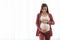 Happy Expectation. Cheerful Pregnant Millennial Woman Touching Her Belly, Standing Against Window