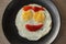 Happy face breakfast, Smiling fried egg by ketchup