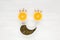 Happy face of fruit and seeds. The smiling face is made from oranges, garlic, and pumpkin seeds. Background of useful antiviral