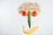 Happy face made with fresh fruits. Tomato, cucumber , banana, pu